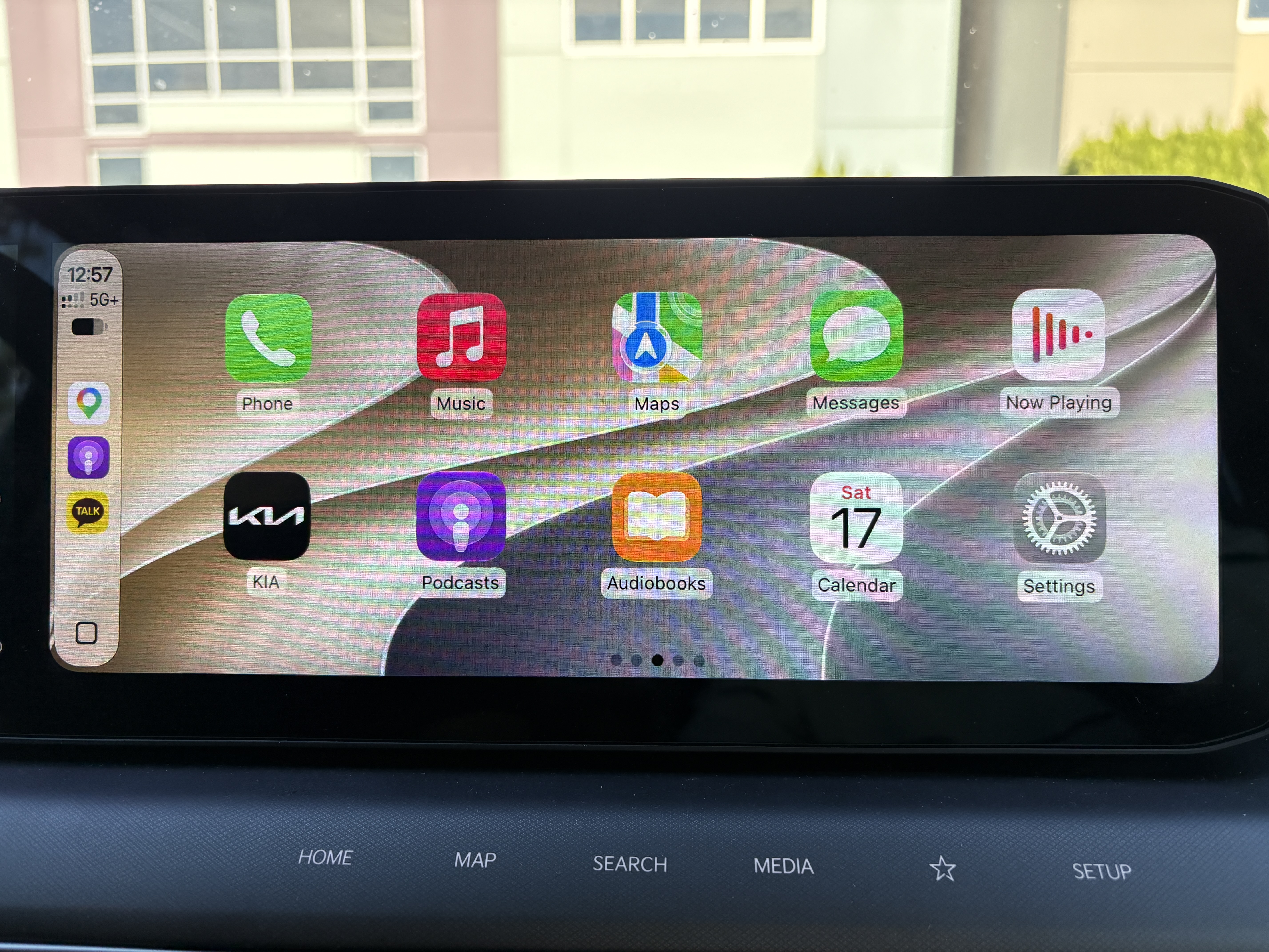 Vehicle infotainment display showing Apple CarPlay apps