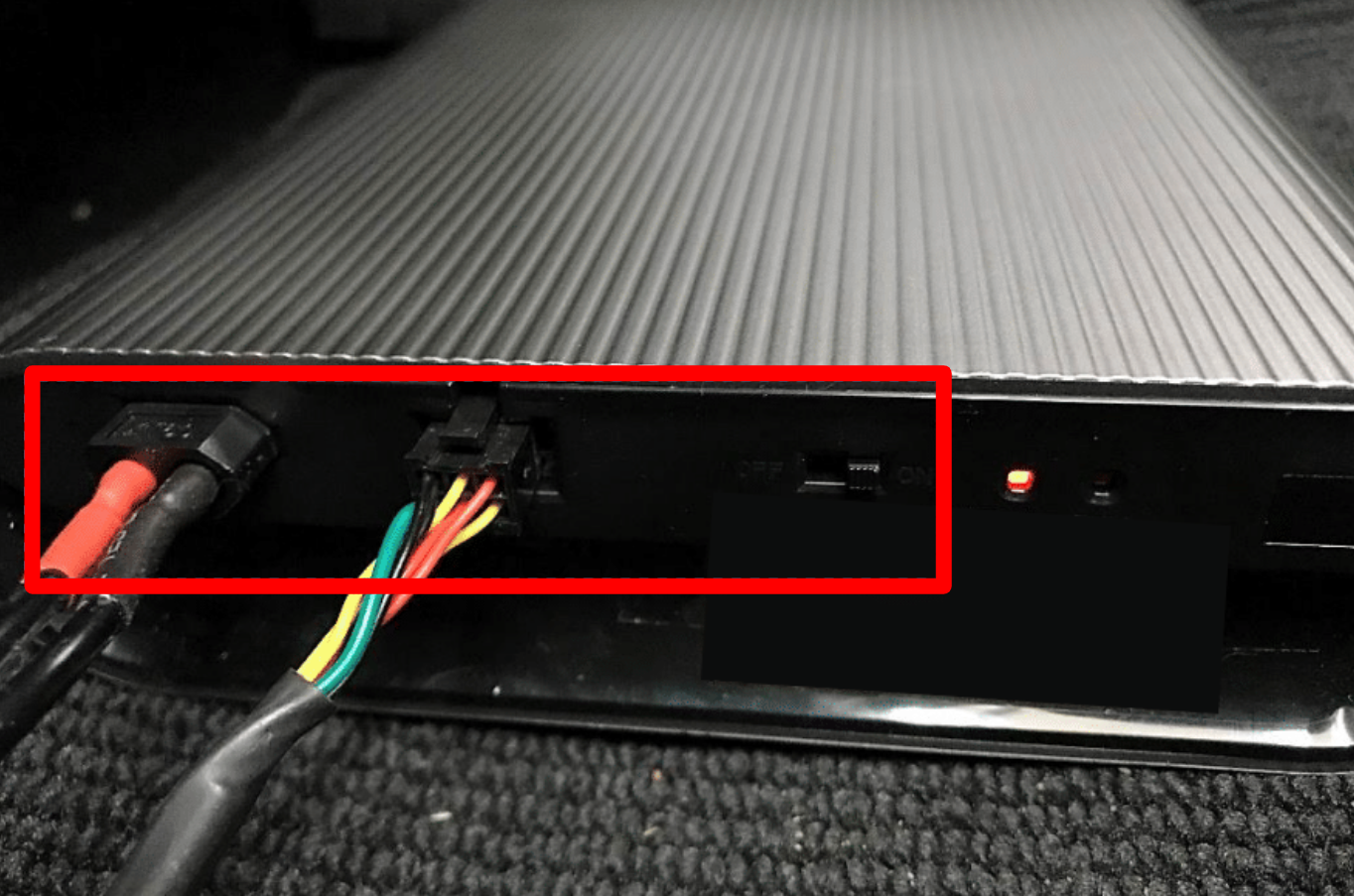 Input cable connected to the input port and output cable connected to the output port