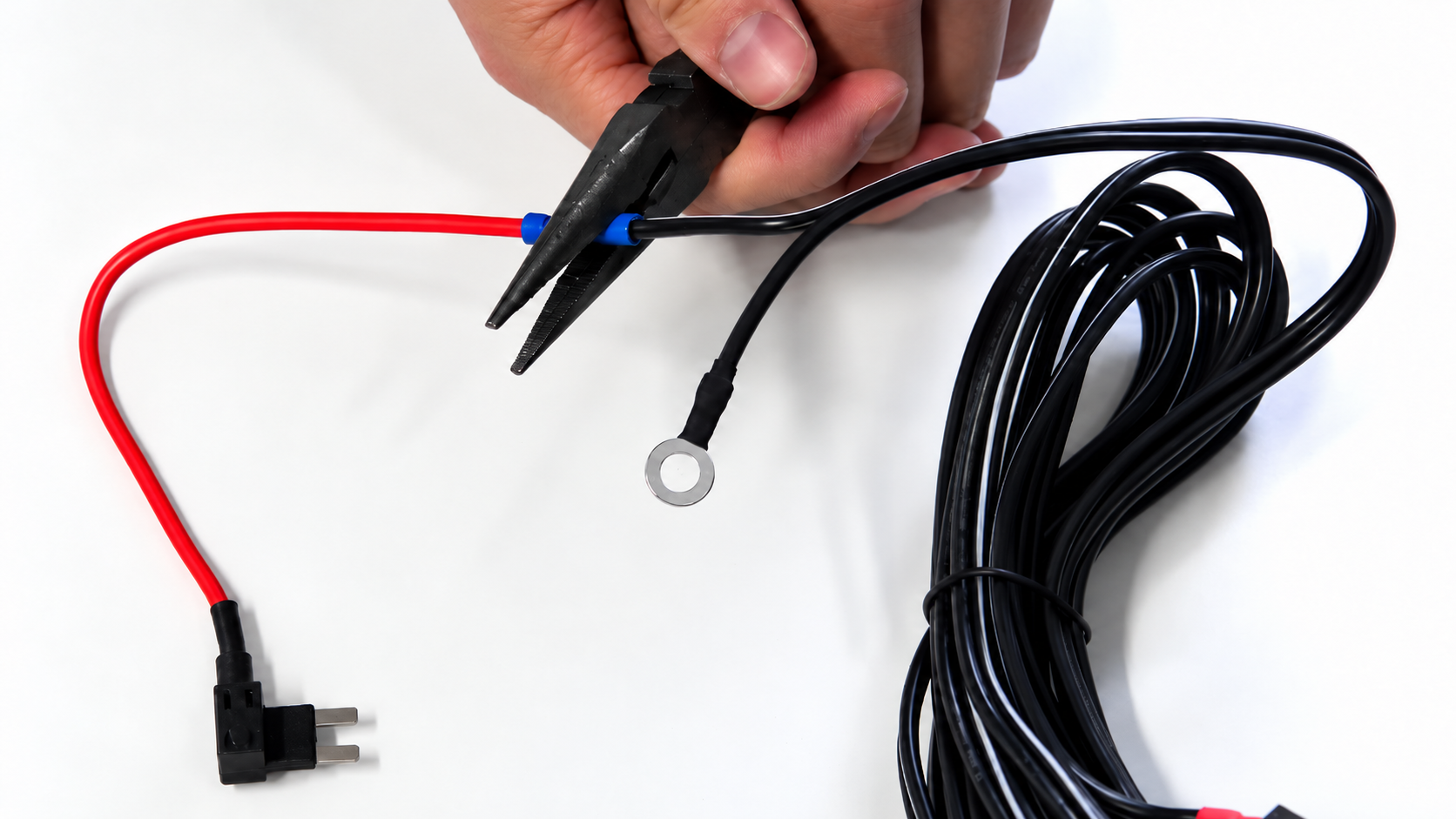 Input wire inserted into the fuse holder sleeve and crimped with pliers