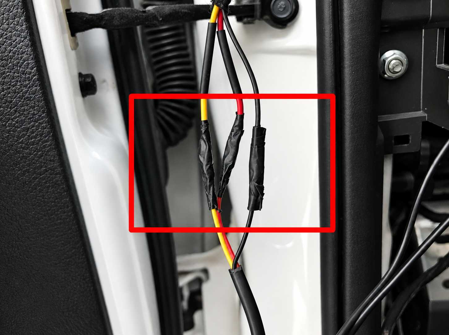 Electrical tape covering the joined power wires